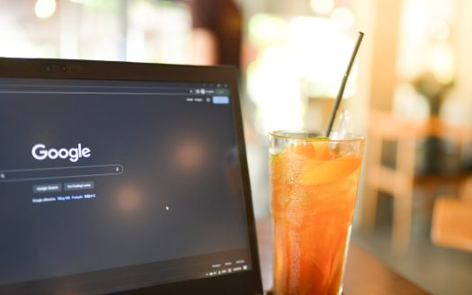 Digital nomad working on laptop in a Vietnamese café